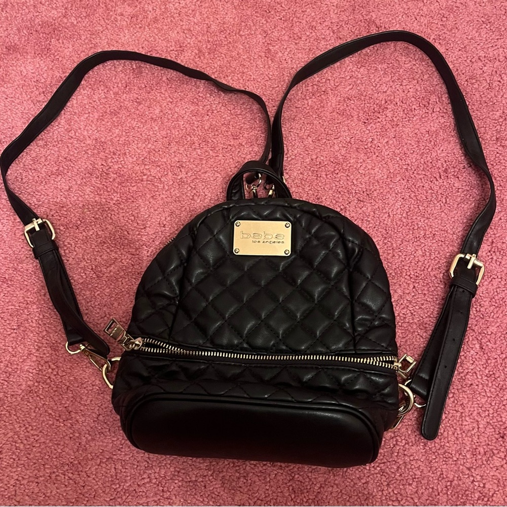 Bebe Black Quilted Backpack with adjustable Straps with gold details